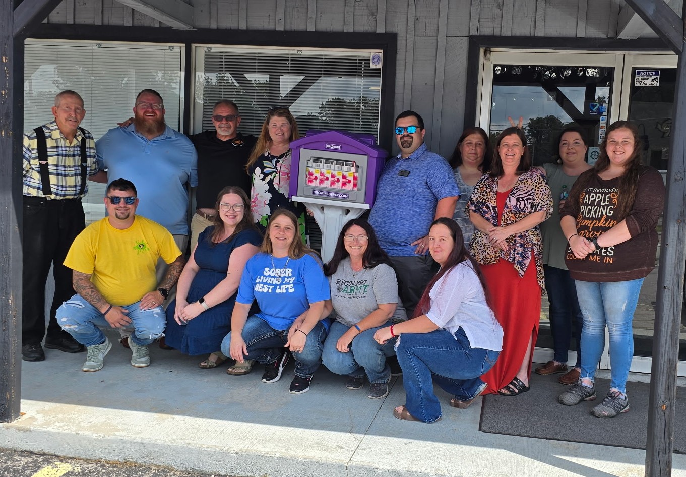 Community members at the unveiling of a Caring Library free Narcan station in McMinnville, Warren County, TN.